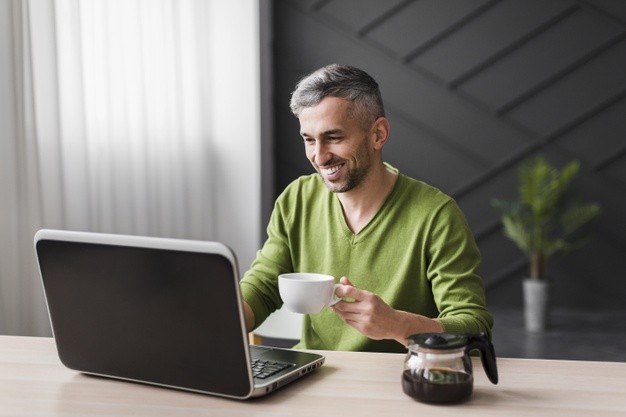 man talking to online loan advisor